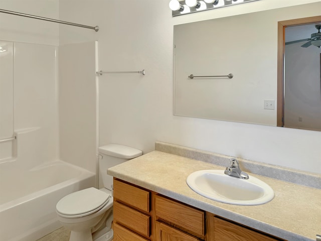 bathroom with vanity, toilet, and tub / shower combination