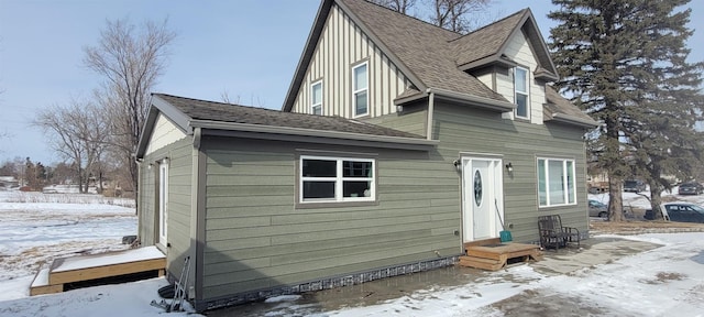 exterior space with a shingled roof