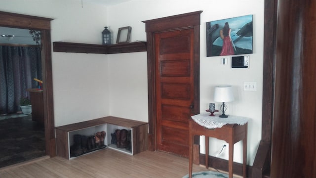 hallway featuring light wood-style floors