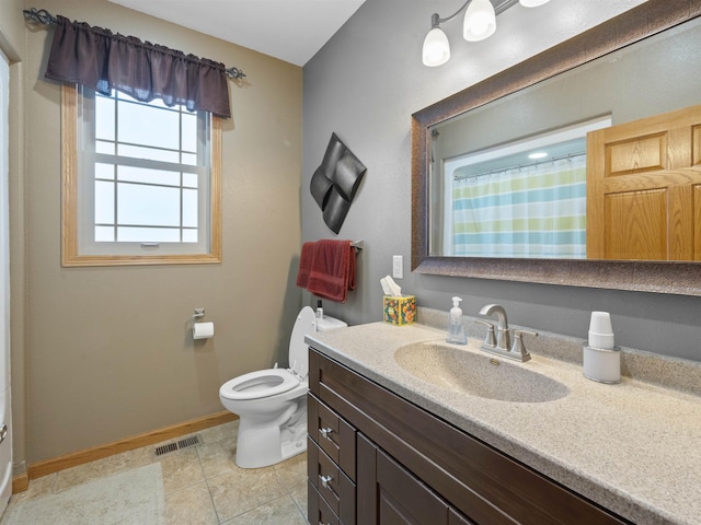 full bath with visible vents, baseboards, toilet, tile patterned floors, and vanity