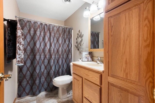 bathroom with vanity, curtained shower, toilet, and visible vents