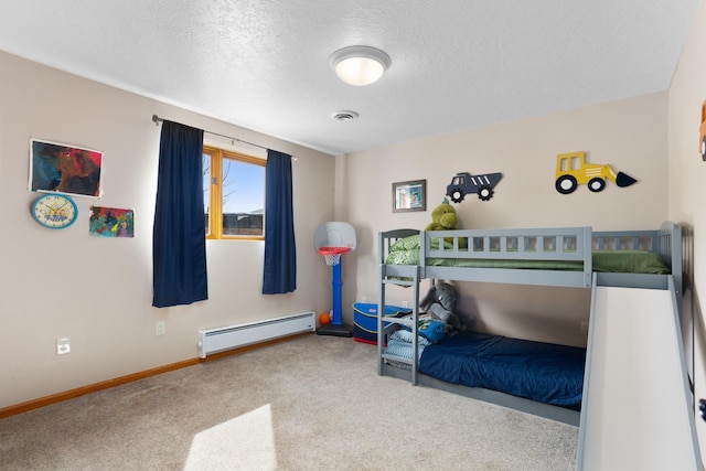 bedroom featuring visible vents, a textured ceiling, carpet flooring, a baseboard radiator, and baseboards