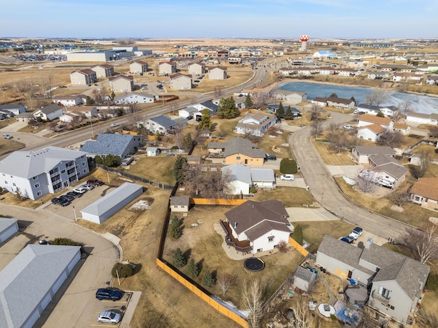 bird's eye view with a residential view and a water view