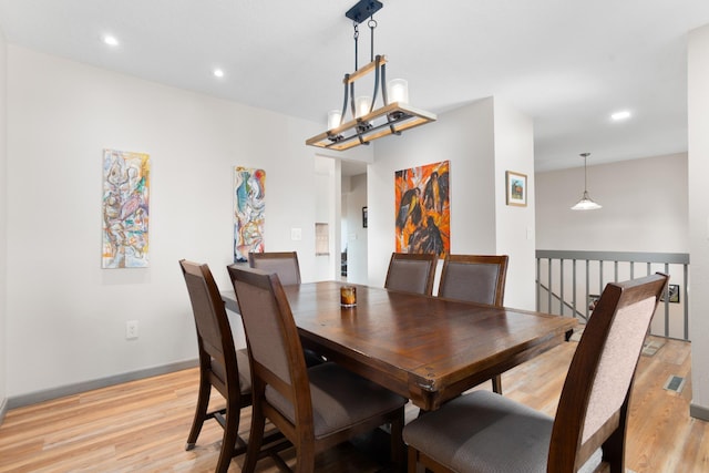 dining area with recessed lighting, visible vents, light wood-type flooring, and baseboards