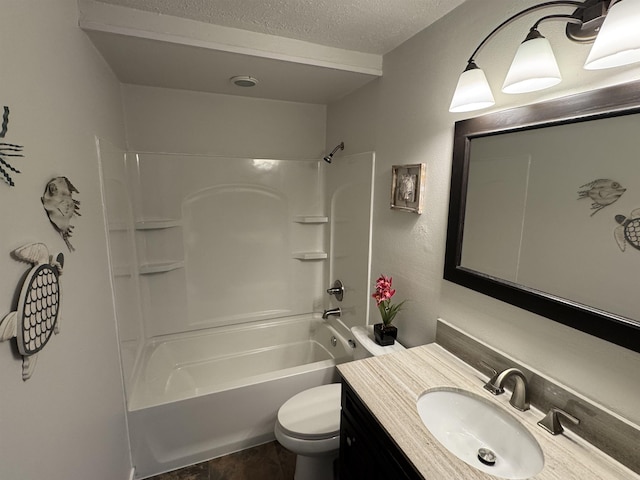 full bath featuring vanity,  shower combination, toilet, and a textured ceiling