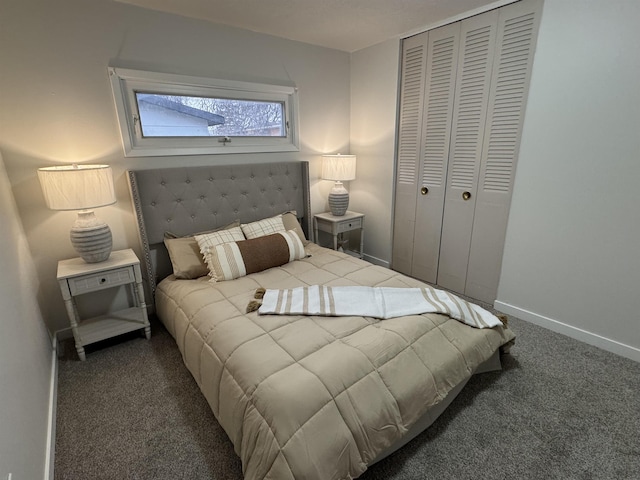 bedroom with carpet flooring, baseboards, and a closet