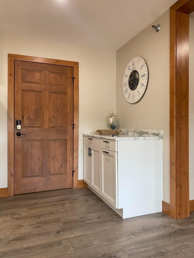 80 Twin Oaks Shr Unit 34, Bottineau, ND 58318 - interior space featuring baseboards and wood finished floors