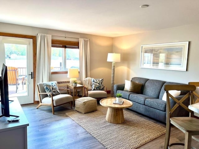 80 Twin Oaks Shr Unit 34, Bottineau, ND 58318 - living area with wood finished floors