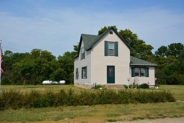 traditional-style house with a shingled roof