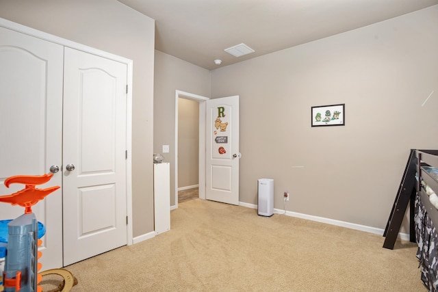 interior space with baseboards and visible vents