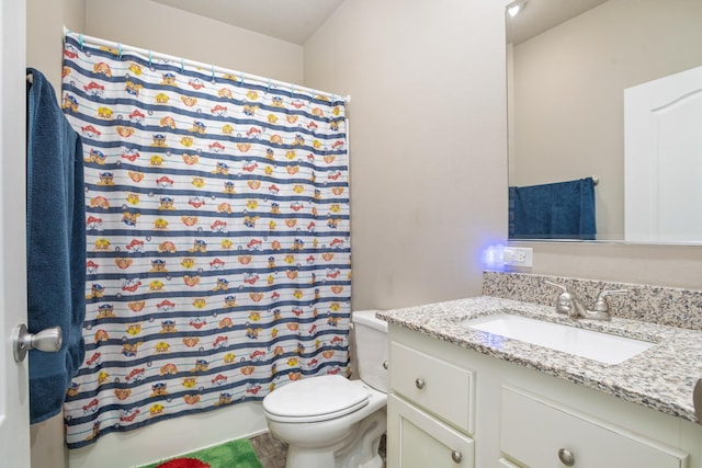 full bath with toilet and vanity