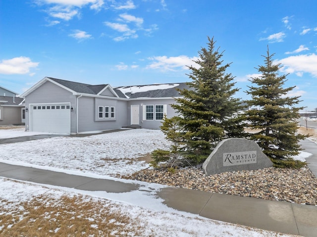 ranch-style house featuring an attached garage
