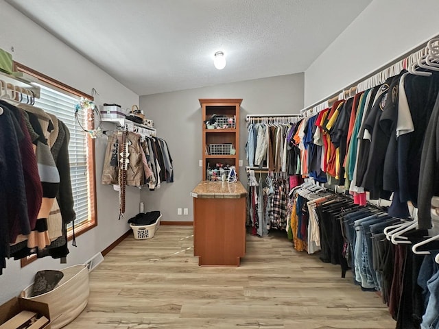 12780 153rd St, Sawyer, ND 58781 - walk in closet featuring visible vents and light wood finished floors