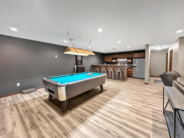 12780 153rd St, Sawyer, ND 58781 - rec room featuring pool table, recessed lighting, wet bar, and light wood-style floors