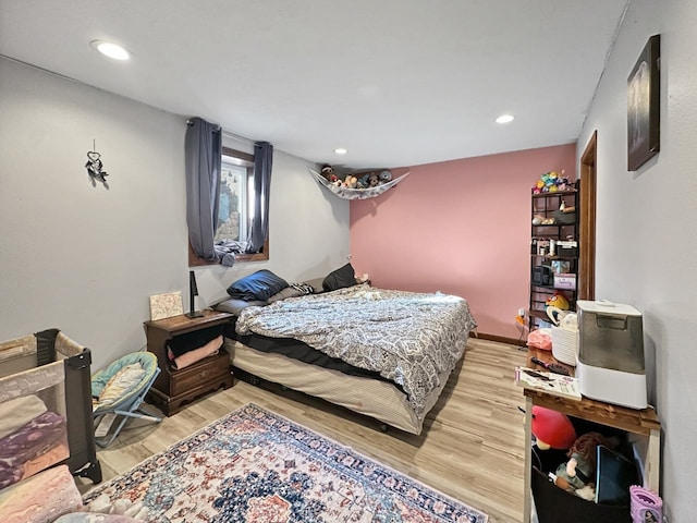 12780 153rd St, Sawyer, ND 58781 - bedroom featuring wood finished floors, baseboards, and recessed lighting
