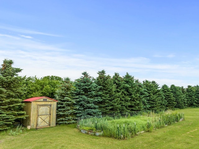 12780 153rd St, Sawyer, ND 58781 - view of yard with a storage unit and an outdoor structure