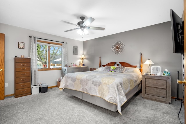 1419 17 1/2 Ave, Minot, ND 58701 - bedroom featuring carpet flooring, baseboards, and a ceiling fan
