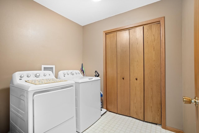 1419 17 1/2 Ave, Minot, ND 58701 - laundry area featuring independent washer and dryer, laundry area, and light floors