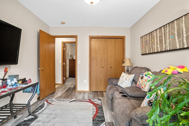1419 17 1/2 Ave, Minot, ND 58701 - living area with light wood-style flooring and baseboards