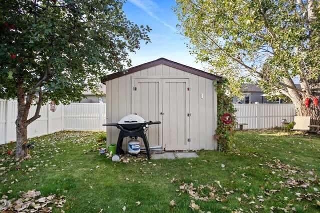 1419 17 1/2 Ave, Minot, ND 58701 - view of shed with a fenced backyard