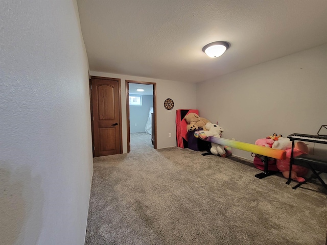 1425 9th St, Minot, ND 58701 - bedroom with a textured ceiling and carpet
