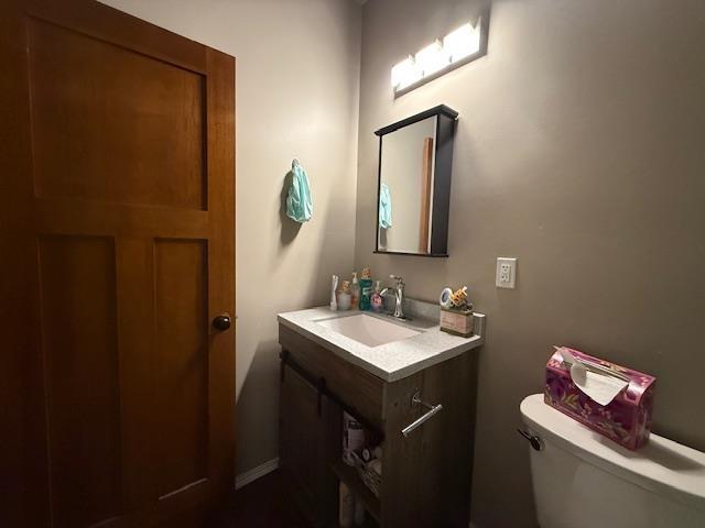 38 Mulberry Loop, Minot, ND 58703 - bathroom with toilet and vanity