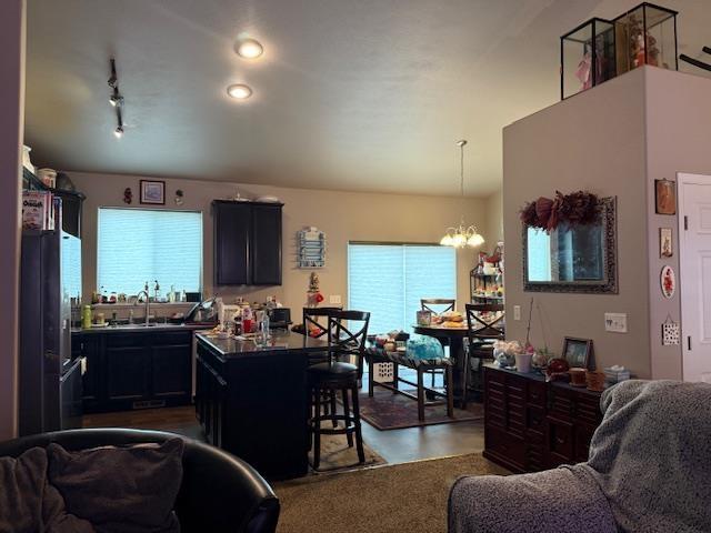 38 Mulberry Loop, Minot, ND 58703 - interior space with a chandelier