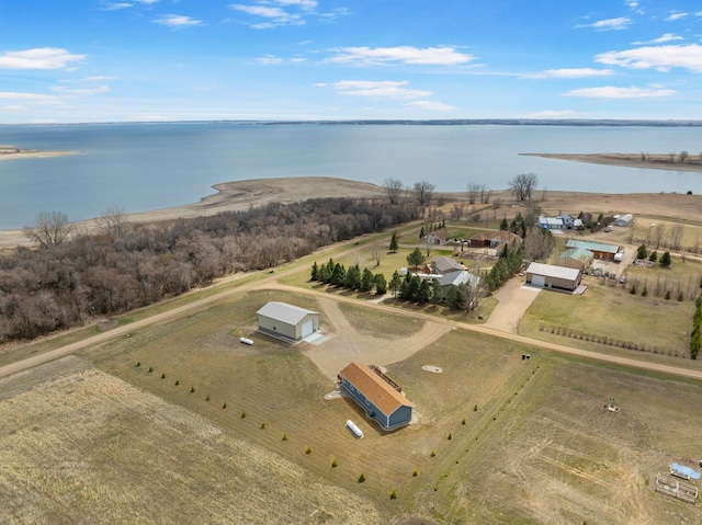 aerial view featuring a rural view and a water view
