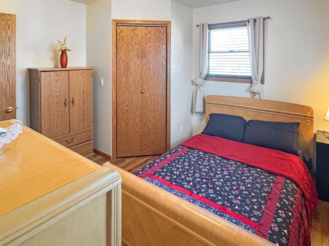 812 15 1/2 Ave SE, Minot, ND 58701 - bedroom featuring wood finished floors