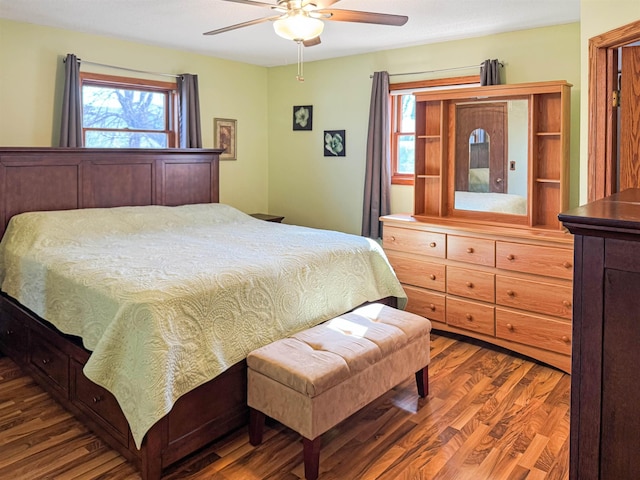 812 15 1/2 Ave SE, Minot, ND 58701 - bedroom featuring wood finished floors and ceiling fan