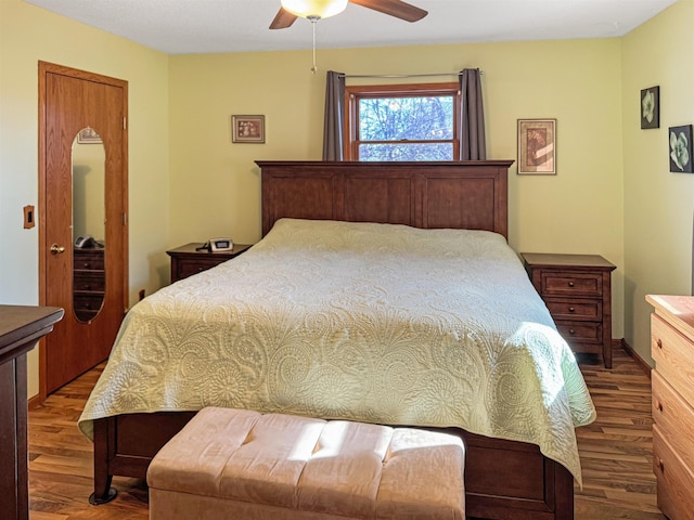 812 15 1/2 Ave SE, Minot, ND 58701 - bedroom featuring wood finished floors and ceiling fan