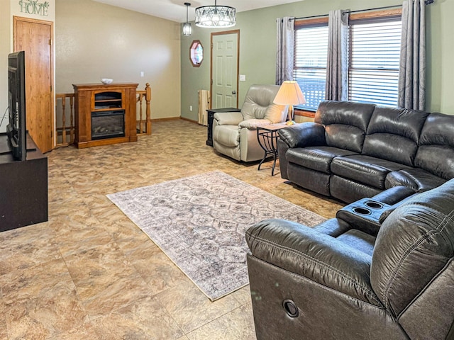 812 15 1/2 Ave SE, Minot, ND 58701 - living room with baseboards and an inviting chandelier