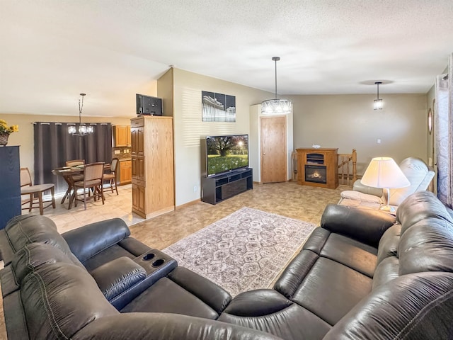 812 15 1/2 Ave SE, Minot, ND 58701 - living room with baseboards and a notable chandelier