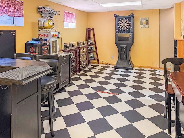 812 15 1/2 Ave SE, Minot, ND 58701 - office featuring tile patterned floors, baseboards, and a drop ceiling