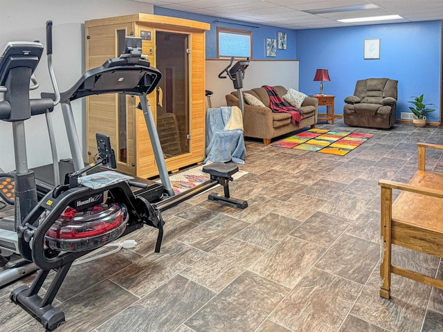 812 15 1/2 Ave SE, Minot, ND 58701 - exercise room featuring a paneled ceiling