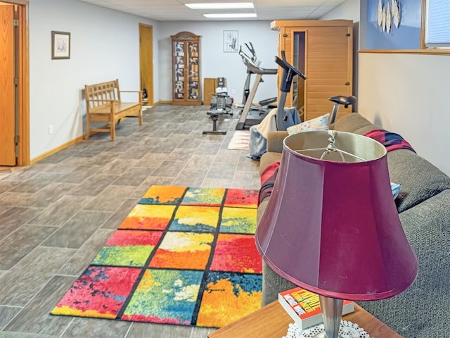 812 15 1/2 Ave SE, Minot, ND 58701 - workout room featuring a paneled ceiling and baseboards