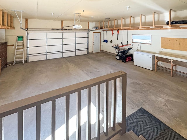 812 15 1/2 Ave SE, Minot, ND 58701 - garage featuring refrigerator and a garage door opener