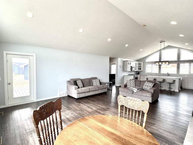 living area with vaulted ceiling, baseboards, visible vents, recessed lighting, and dark wood-type flooring