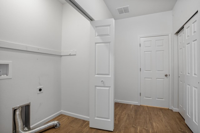 washroom with wood finished floors, laundry area, electric dryer hookup, baseboards, and visible vents