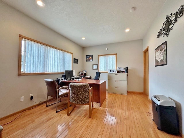 office area featuring recessed lighting, light wood-style flooring, and baseboards