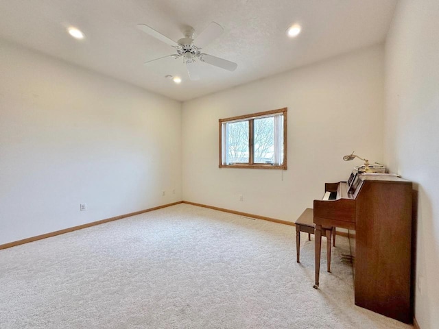 unfurnished room featuring recessed lighting, ceiling fan, light carpet, and baseboards