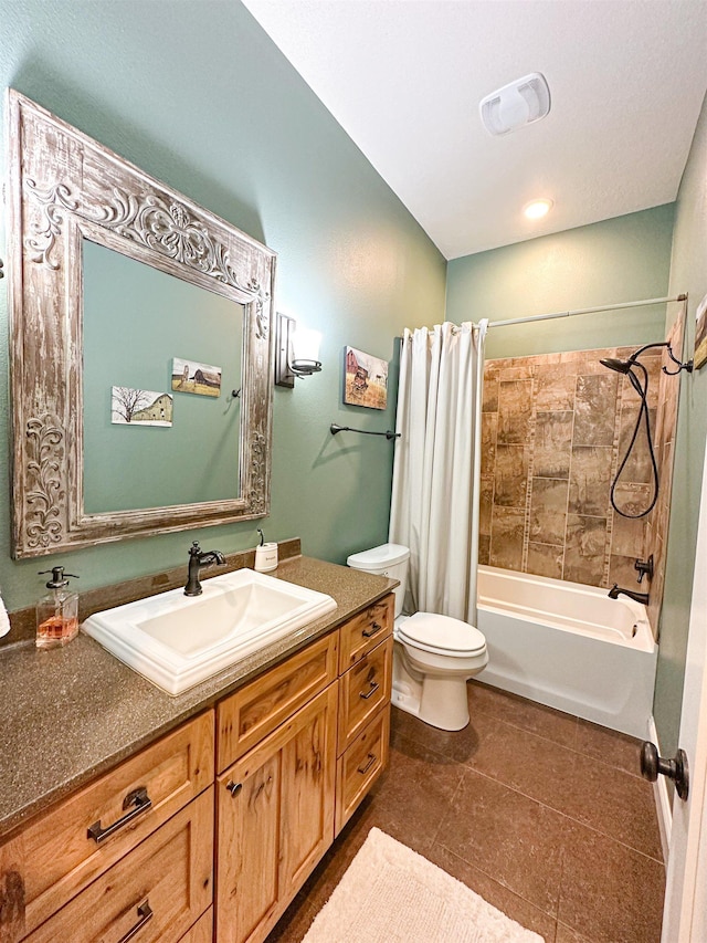 full bathroom featuring tile patterned floors, shower / bath combination with curtain, toilet, vanity, and visible vents