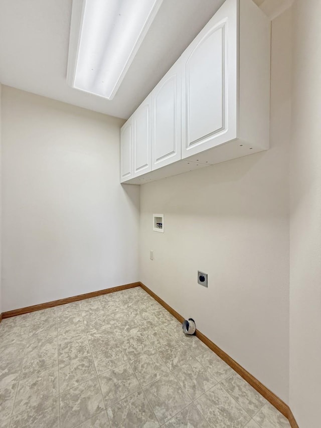 washroom featuring cabinet space, hookup for an electric dryer, baseboards, and washer hookup
