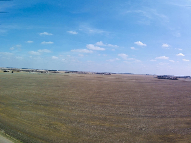 exterior space with a rural view
