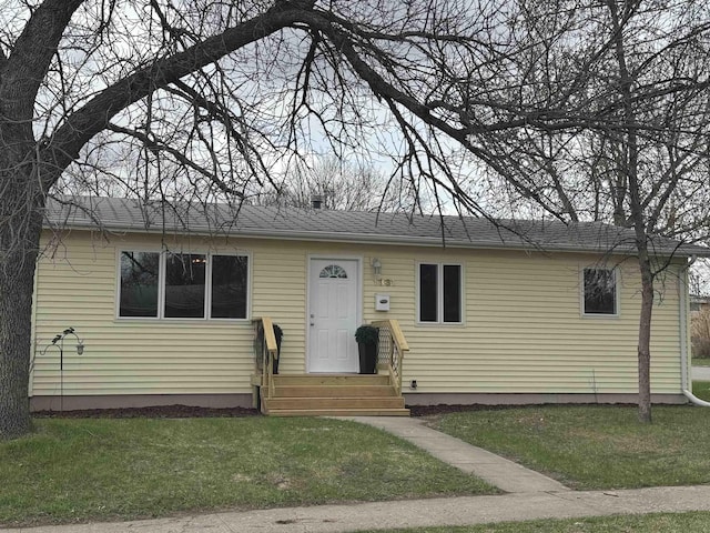 1331 4th St, Minot, ND 58701 - single story home with a front lawn