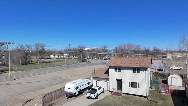 view of front of property featuring an attached garage and driveway