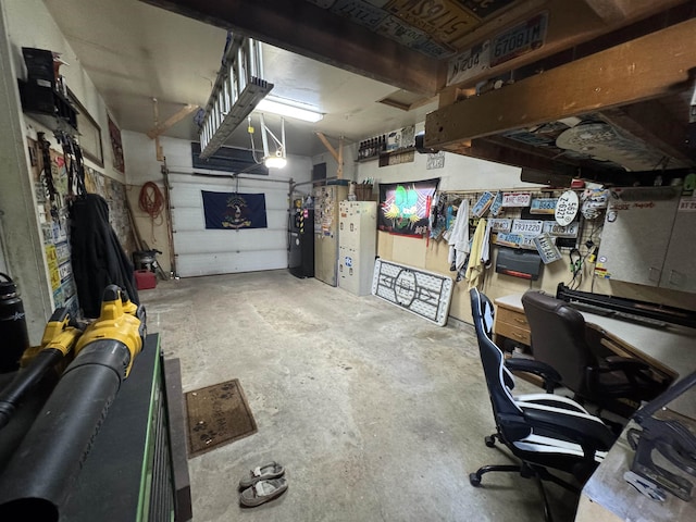 below grade area featuring a garage and water heater