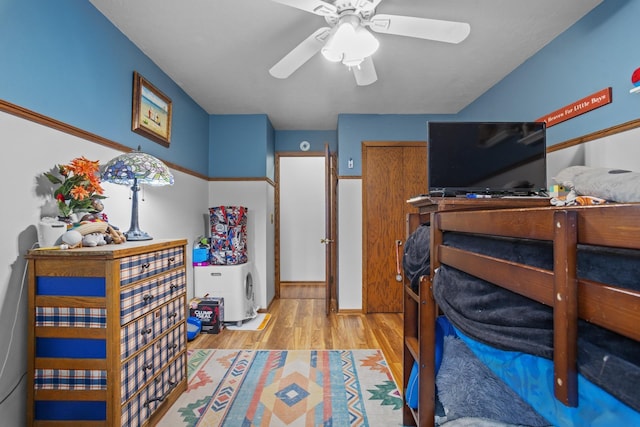 9500 135th Ave, Sawyer, ND 58781 - bedroom featuring a ceiling fan and wood finished floors