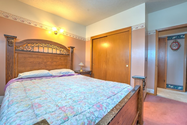 carpeted bedroom featuring a closet