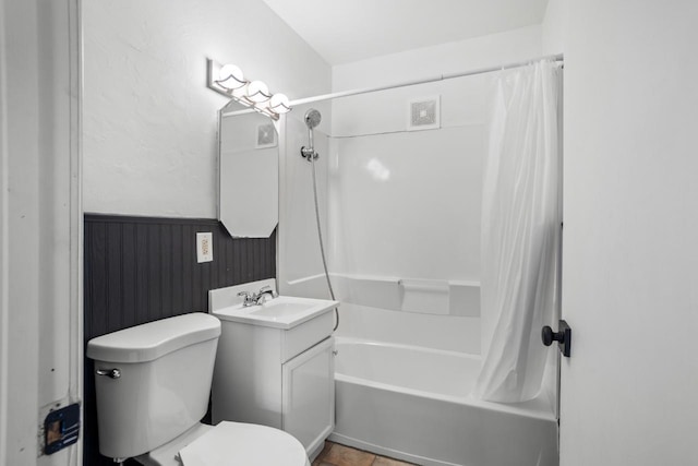 full bathroom with shower / bath combination with curtain, toilet, visible vents, and vanity